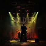 Image of AI Thumbnail: The Anthem of Resilience: Kobra And The Lotus’ ‘Soldier’